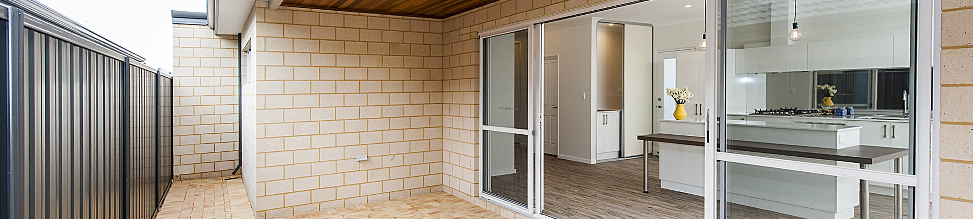 Open-plan kitchen and alfresco interior of a Zenecon home