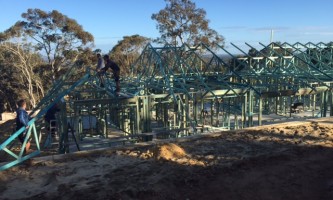 Timber roof truss work on a Zenecon construction project in Byford